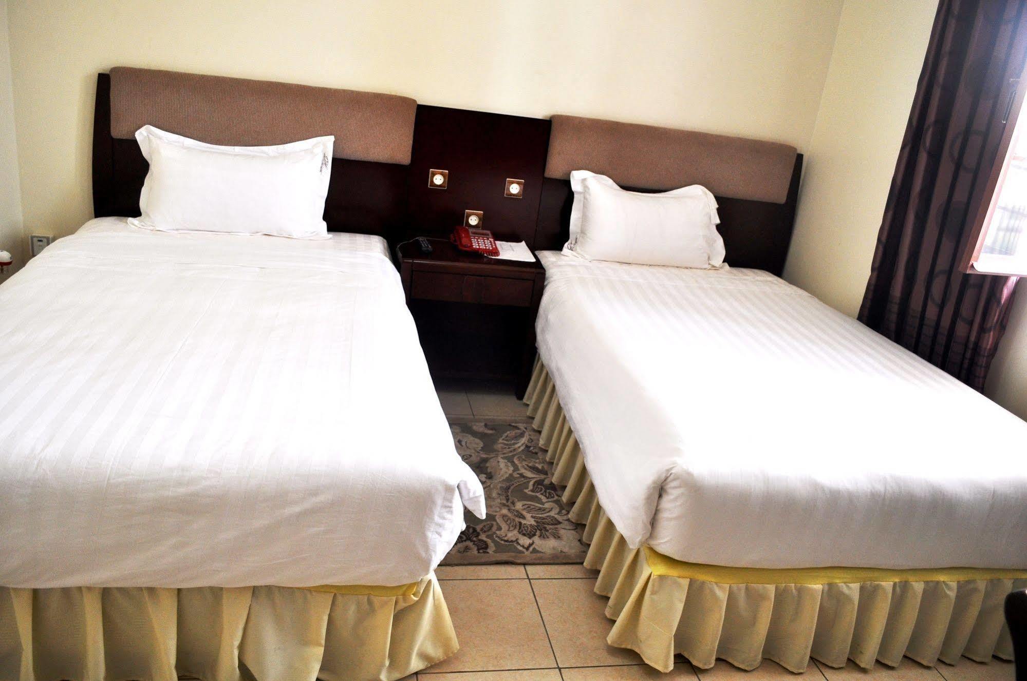 Quiet Haven Hotel Кигали Экстерьер фото