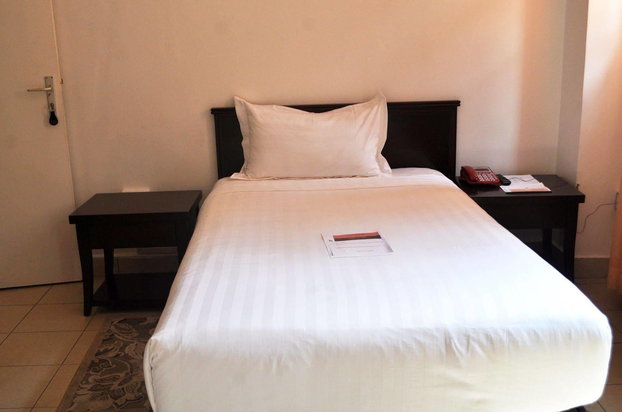 Quiet Haven Hotel Кигали Экстерьер фото