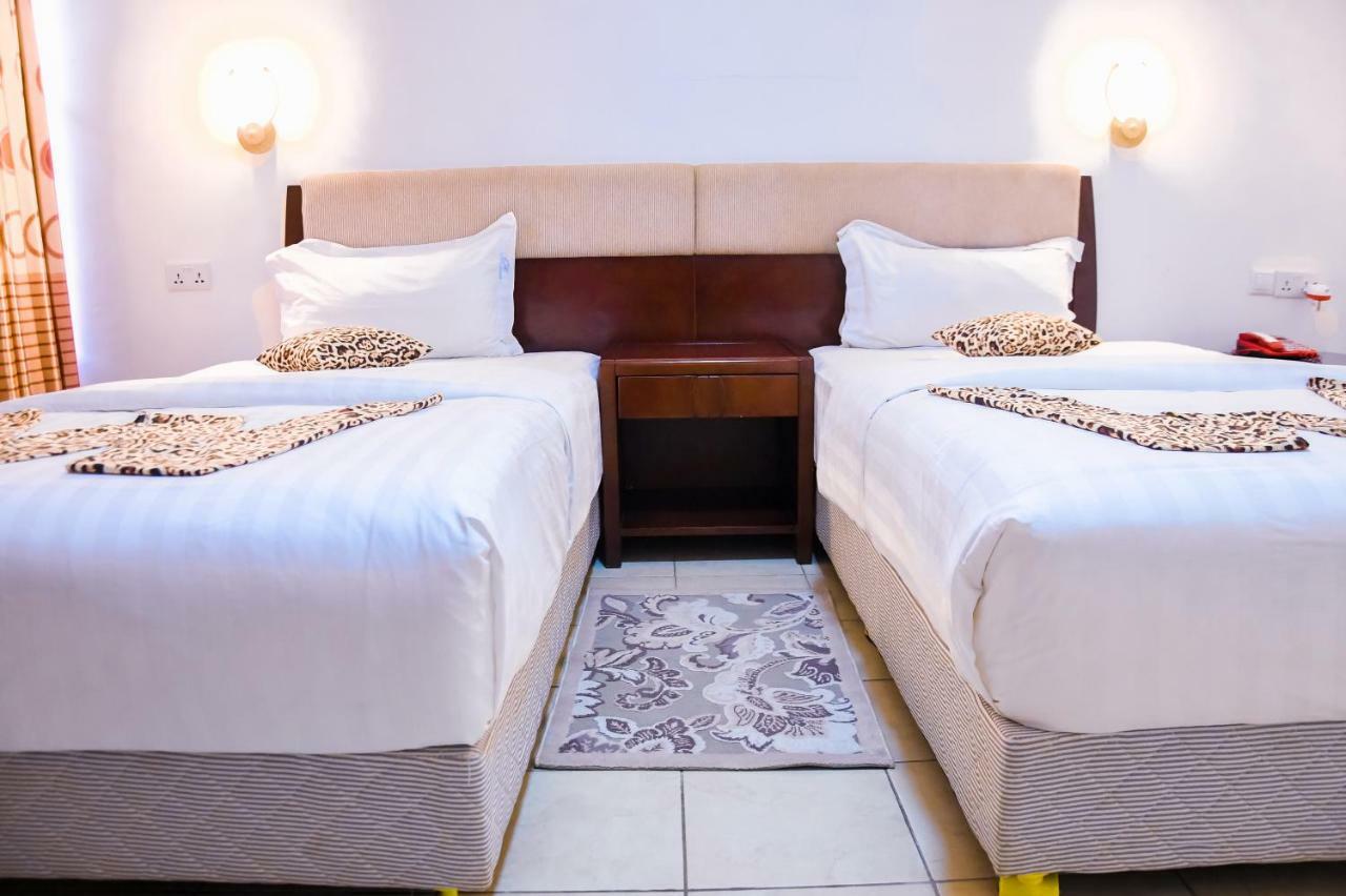 Quiet Haven Hotel Кигали Экстерьер фото